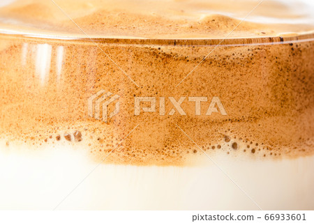 Texture of a foamed coffee drink. Texture of a foamed coffee drink. 66933601