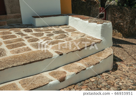 Stone steps on house facade at Castelo de Vide 66933951