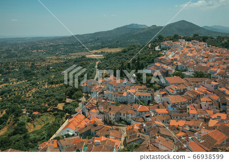 City landscape with old building roofs and church at Castelo de Vide 66938599