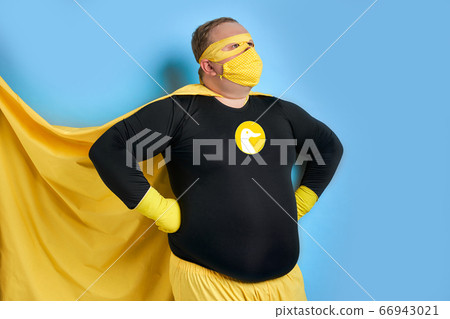 caucasian fat cleaning man in costume of superhero caucasian fat cleaning man in costume of superhero 66943021