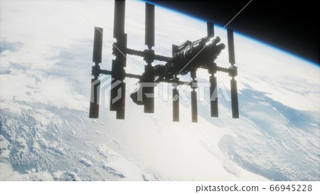 A view of the Earth and a spaceship. ISS is A view of the Earth and a spaceship. ISS is 66945228