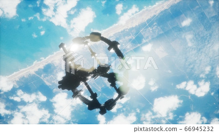 A view of the Earth and a spaceship. ISS is A view of the Earth and a spaceship. ISS is 66945232