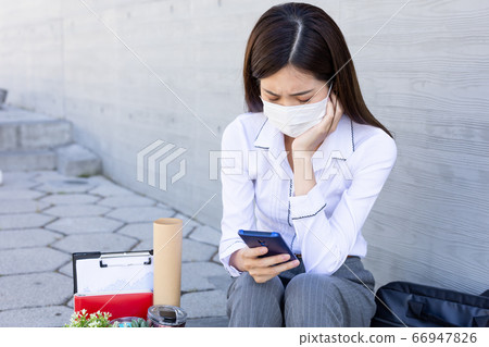 Asian woman being fired 66947826