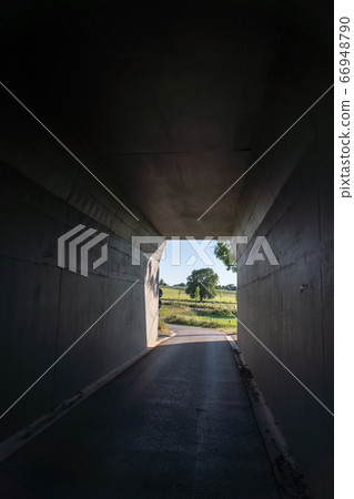bicycle street under a bridge 66948790