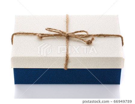 Cardboard box on a white background. Gift box with sacking ribbon. Cardboard box on a white background. Gift box with sacking ribbon. 66949789