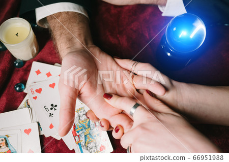 reading the lines hand in a man's hands 66951988