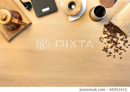 Directly above shot of coffee with roasted beans by weight scale on table 66952415