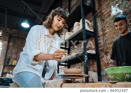 Making a handmade clay pot. Pottery lesson, hobby. 66952497