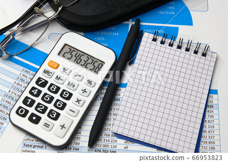 business office desk closeup - financial reports, 66953823