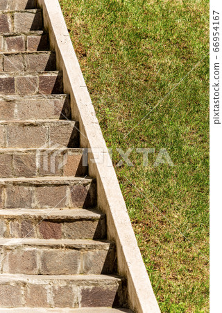 Closeup of a Porphyry Staircase and Green Lawn Closeup of a Porphyry Staircase and Green Lawn 66954167