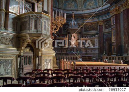 Catholic Cathedral interior with paintings and statues, Budapest. Catholic Cathedral interior with paintings and statues, Budapest. 66955027