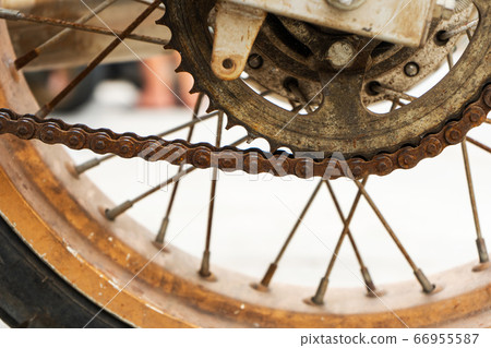 Old rusty motorcycle. typical vehicle in Asia. Old rusty motorcycle. typical vehicle in Asia. 66955587
