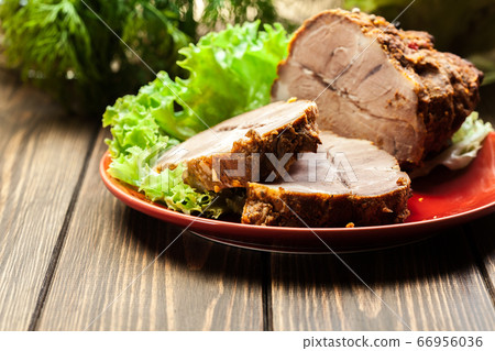 Roasted pork neck with spices on cutting board 66956036