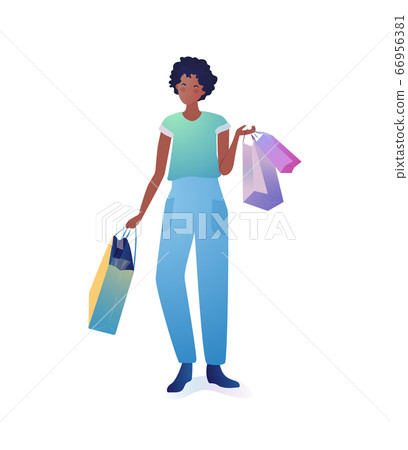 Young woman holding shopping bags. Young woman holding shopping bags. 66956381