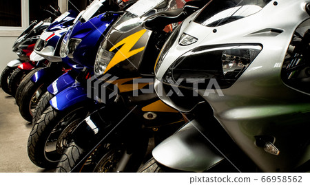 Colored sports road beautiful bikes in motor show Colored sports road beautiful bikes in motor show 66958562