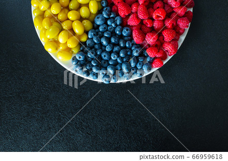 View from above. A mix of yellow, red and blue View from above. A mix of yellow, red and blue 66959618