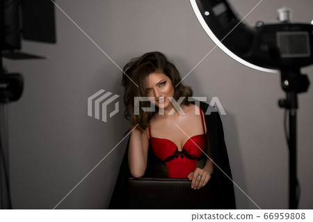 Young beautiful sexy model posing in photo studio 66959808