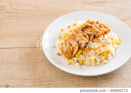 fried rice with grilled chicken and teriyaki sauce fried rice with grilled chicken and teriyaki sauce 66960573