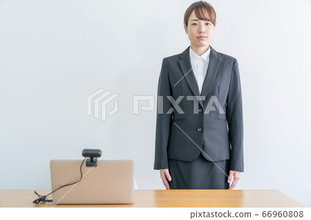 Young woman interviewing online using a webcam [Image of job hunting] 66960808