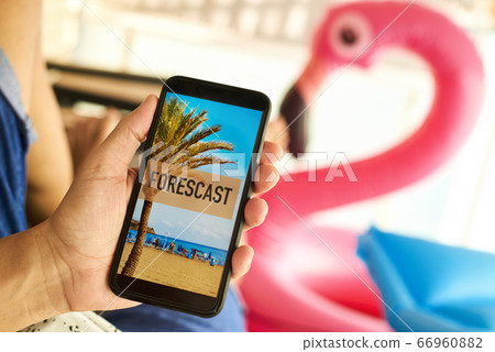 man and text forecast in his smartphone man and text forecast in his smartphone 66960882