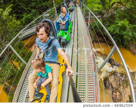 Father and son on the alpine coaster 66962504