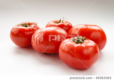 Tomato few vegetables on white background close up Tomato few vegetables on white background close up 66963064