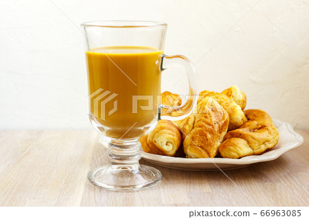 Milk coffee gluss cup and white plate of Milk coffee gluss cup and white plate of 66963085