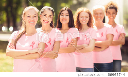 Breast Cancer Volunteers Standing Smiling To Camera In Park, Panorama Breast Cancer Volunteers Standing Smiling To Camera In Park, Panorama 66963744