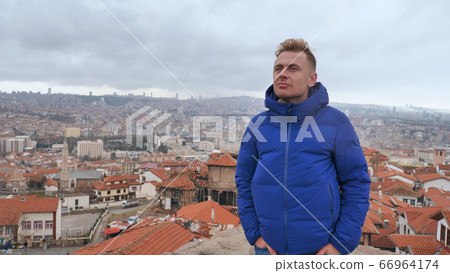 A tourist looks at the panorama of Ankara, the capital of Turkey. A tourist looks at the panorama of Ankara, the capital of Turkey. 66964174