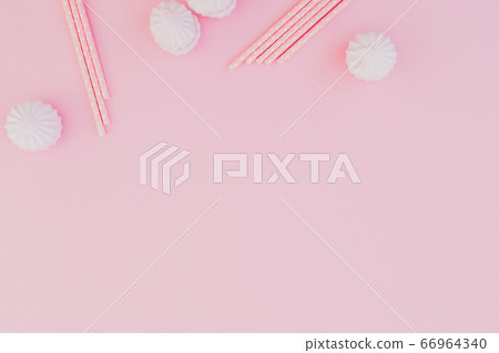 Marshmallow with straws isoated on pink background. Flat lay. Top view Marshmallow with straws isoated on pink background. Flat lay. Top view 66964340