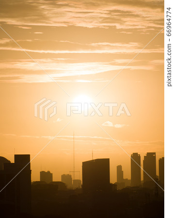 Beautiful sunset over the capital of Indonesia - Jakarta. Beautiful sunset over the capital of Indonesia - Jakarta. 66964774