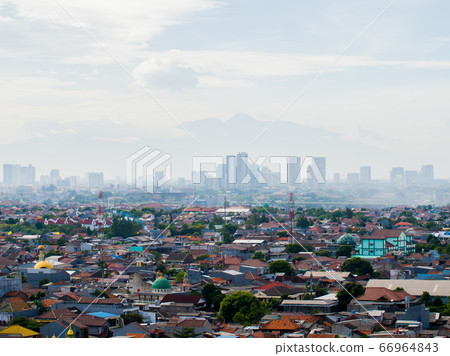 Panorama of the city of Jakarta against the backdrop of the Mountains. Panorama of the city of Jakarta against the backdrop of the Mountains. 66964843
