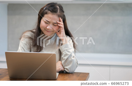 Asian women work from home and stressed due to Asian women work from home and stressed due to 66965273