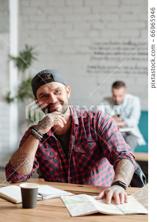 Handsome traveler in cafe Handsome traveler in cafe 66965946