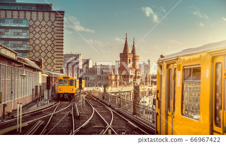Berlin Oberbaum Bridge with trains at sunset, Berlin, Germany Berlin Oberbaum Bridge with trains at sunset, Berlin, Germany 66967422
