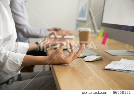 Office yoga for relaxation concept, female hands in mudra, close Office yoga for relaxation concept, female hands in mudra, close 66968131