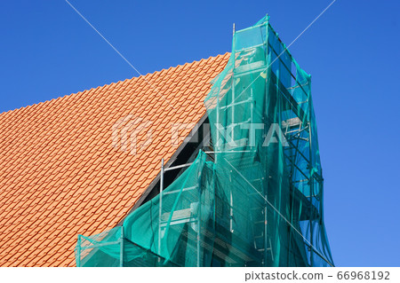 restoration of a historic wooden house and 66968192