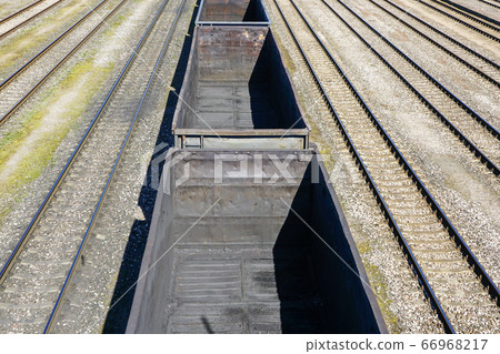 empty bulk wagons and empty tracks, symbol of empty bulk wagons and empty tracks, symbol of 66968217