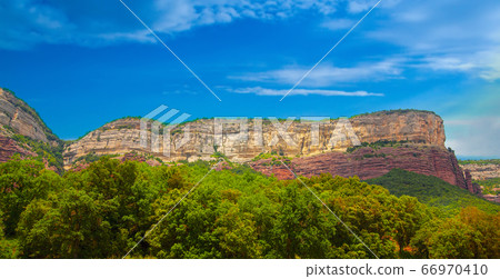Crags  with clouds, Barcelona 66970410