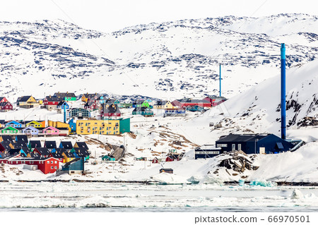 Arctic city panorama with colorful Inuit cottages Arctic city panorama with colorful Inuit cottages 66970501