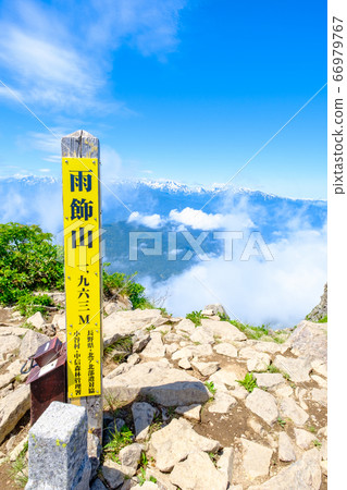 Scenery of the summit of Mt. Amashika (Mountain signs and distant Asahi-dake and Yukikura-dake) Scenery of the summit of Mt. Amashika (Mountain signs and distant Asahi-dake and Yukikura-dake) 66979767