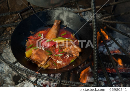 cooking on fire 66980241