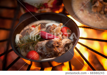 cooking on fire 66980243