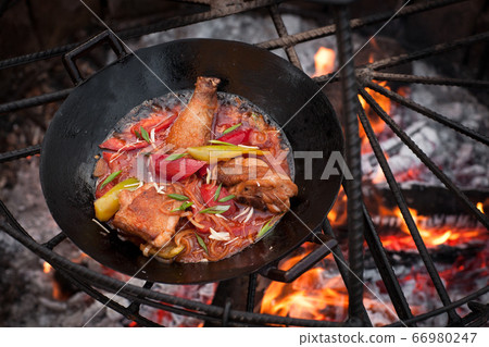 cooking on fire cooking on fire 66980247