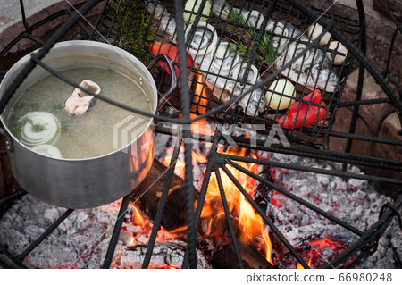 cooking on fire cooking on fire 66980248