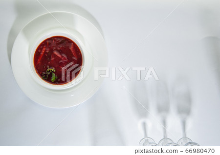 food in a dish on a white surface food in a dish on a white surface 66980470