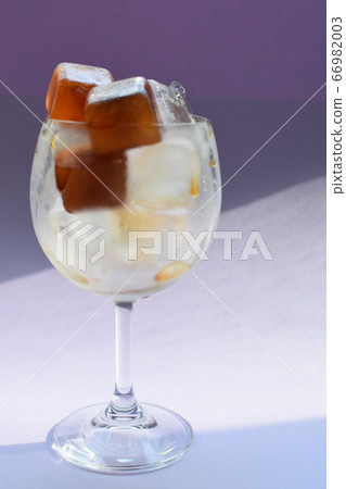 Cool ice coffee cubes on a hot summer day Cool ice coffee cubes on a hot summer day 66982003