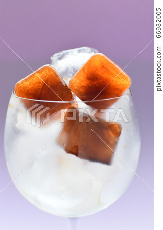 Cool ice coffee cubes on a hot summer day Cool ice coffee cubes on a hot summer day 66982005