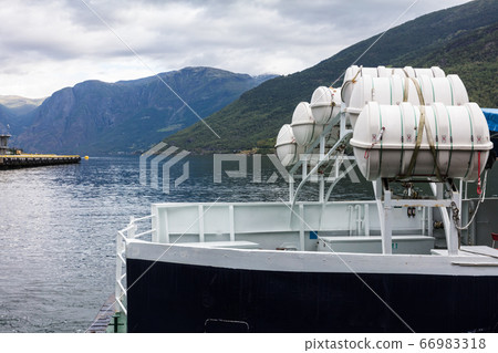 liferaft on a ship in a fjord, 66983318
