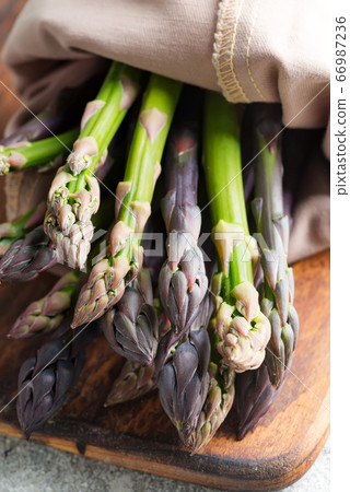 Freshly picked natural organic asparagus bunch on Freshly picked natural organic asparagus bunch on 66987236